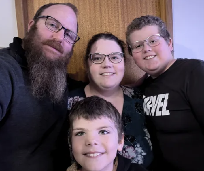 Family picture showing two boys and their parents
